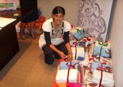 Praneshree wrapping gifts for the Filadelfia Umephi home