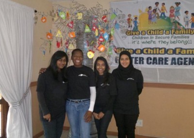 Staff from Coastal Accounting posing with the Give a Child a Family Tree